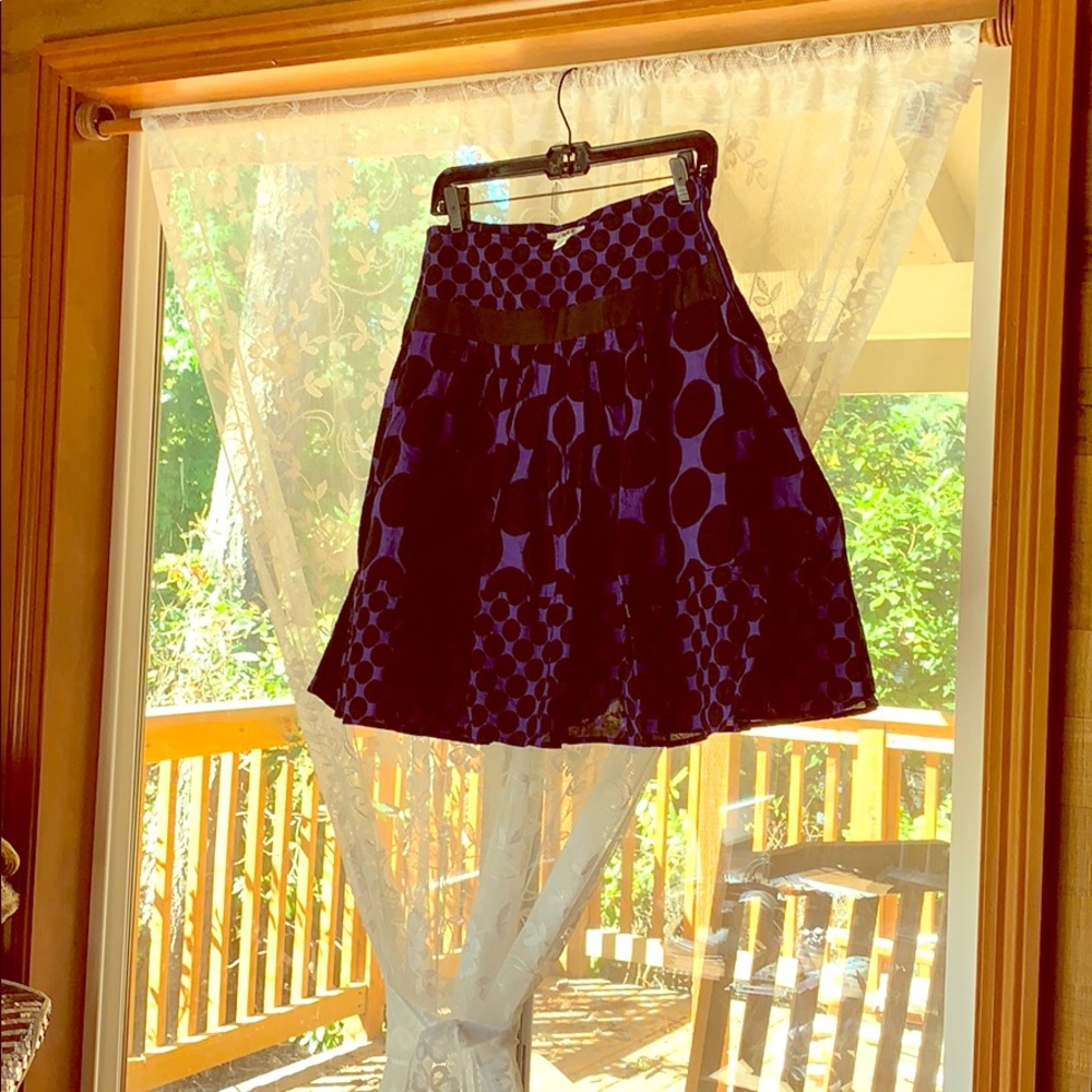 Purple and black polka dot skirts